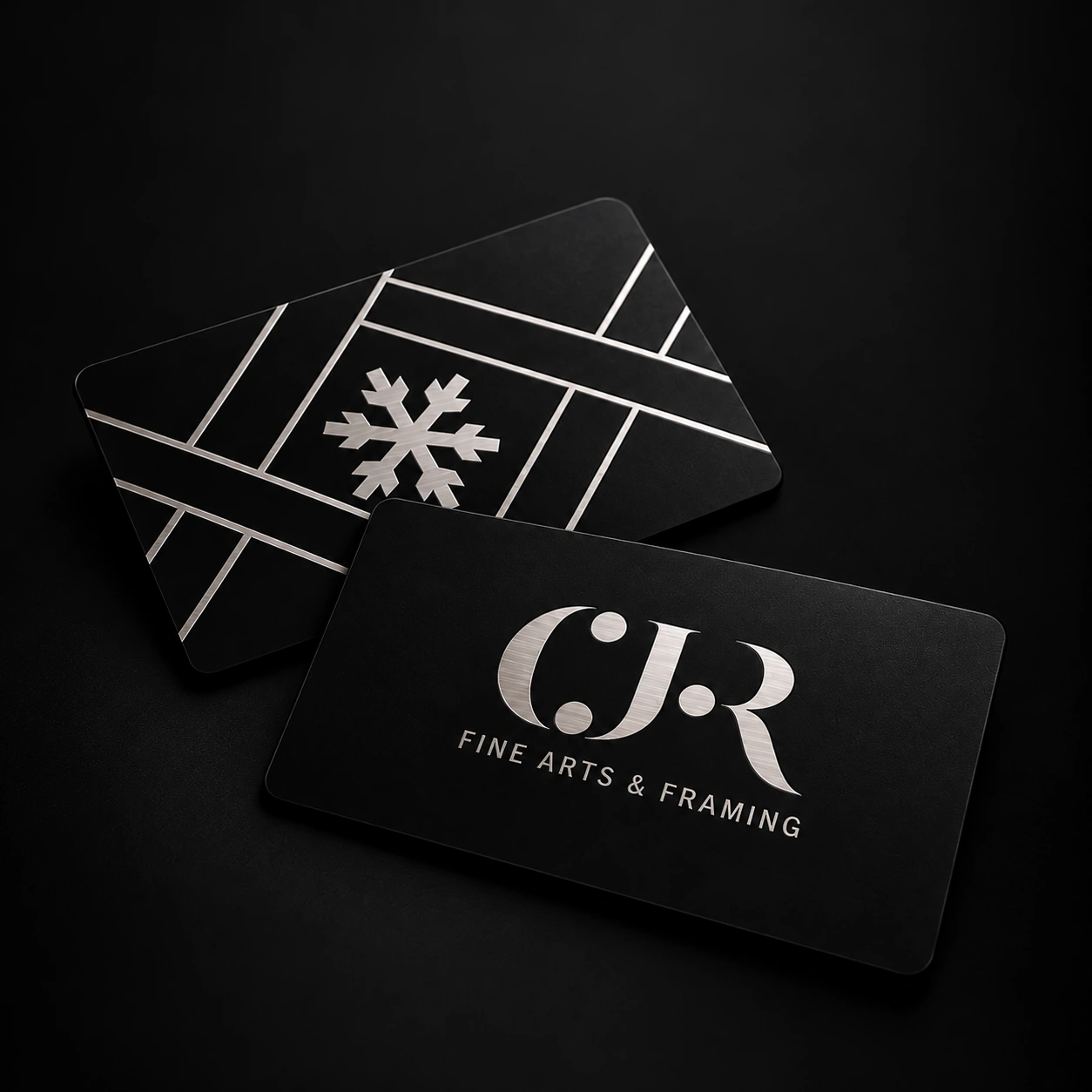 Matte black stainless steel NFC cards with silver engraving, front and back